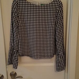 Black and white check blouse with button closure